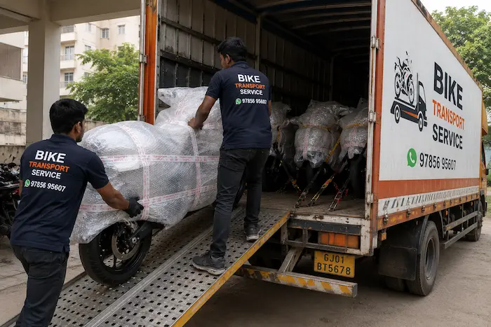 Motorcycle being loaded and strapped for transport